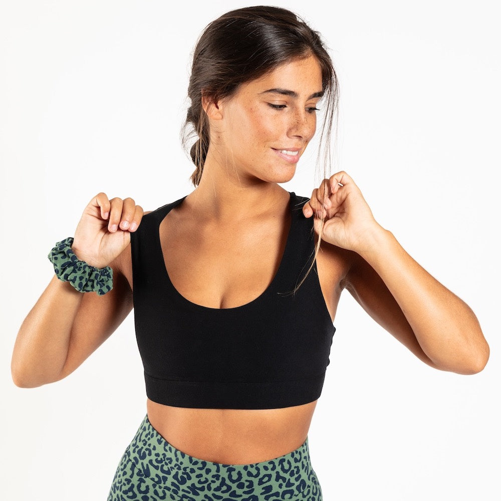 Organic cotton sports bra in black, front view