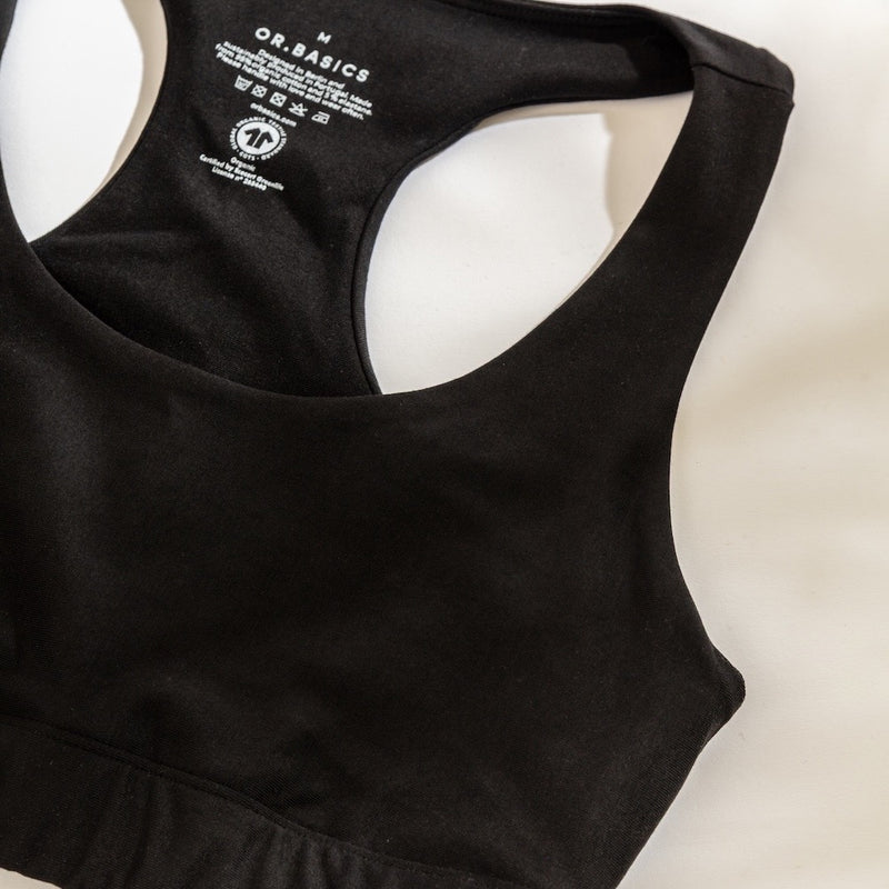 Inside label of GOTS‑certified organic cotton sports bra